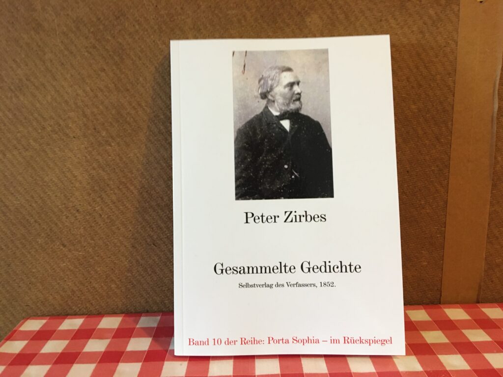 Foto der Vorderseite von Peter Zirbes' "Gesammelte Gedichte" auf dem Küchentisch des Herausgebers