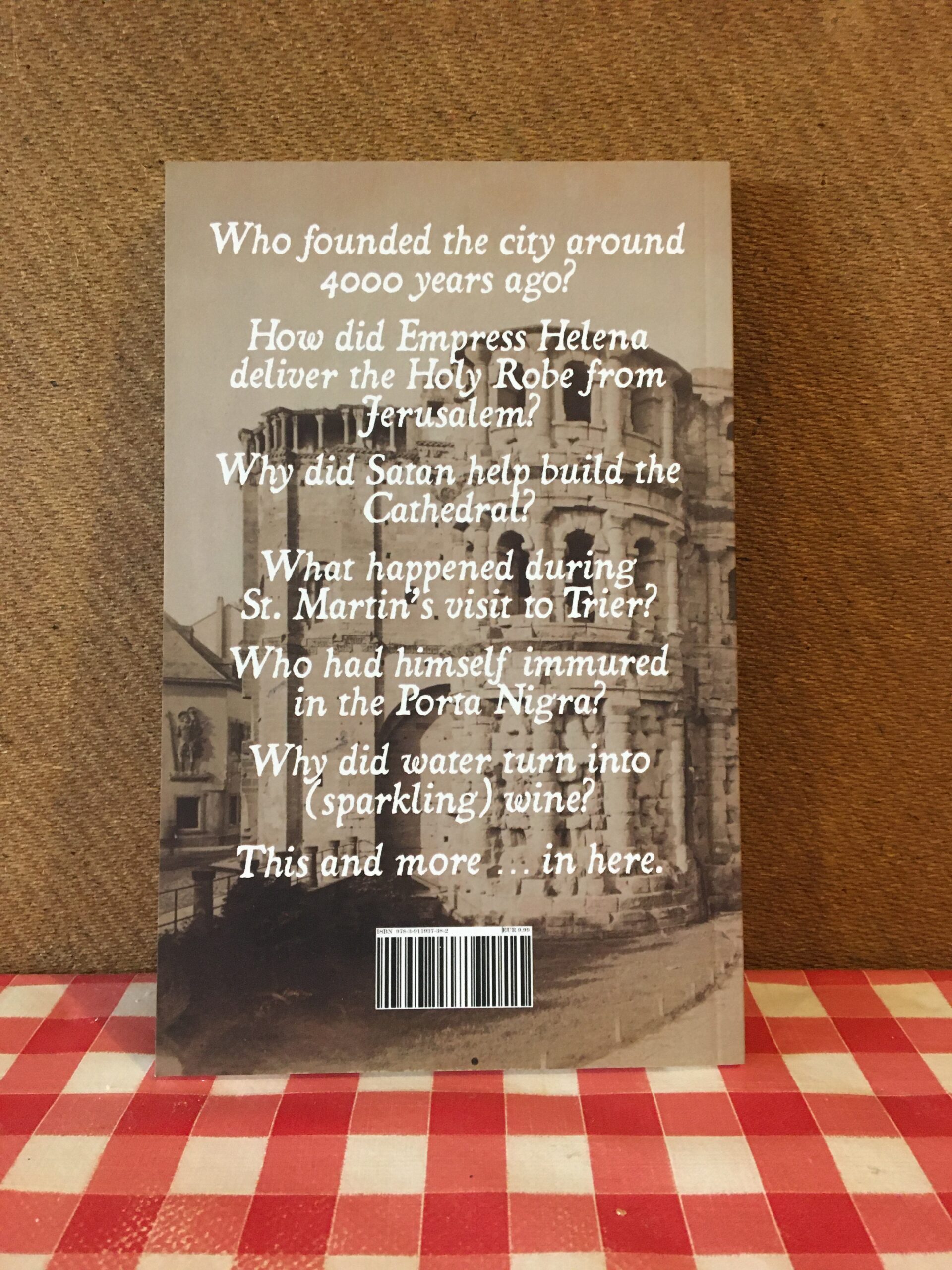Trier Tales back cover, photographed standing on the author's kitchen table.